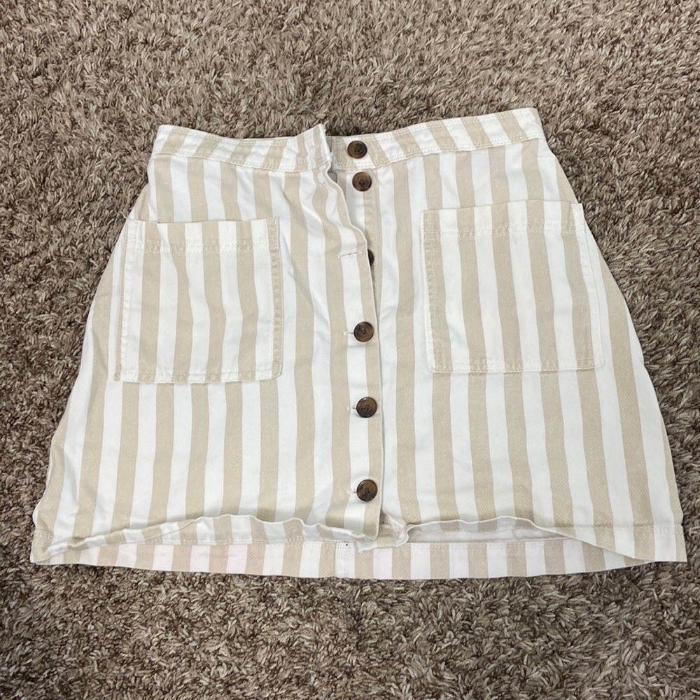 Old Navy skirt. Cream and tan stripes, brown buttons. Two pockets. - Picture 1 of 2